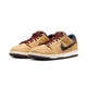 Nike SB Dunk Low 'City Of Cinema', celestial gold / black / dark team red.